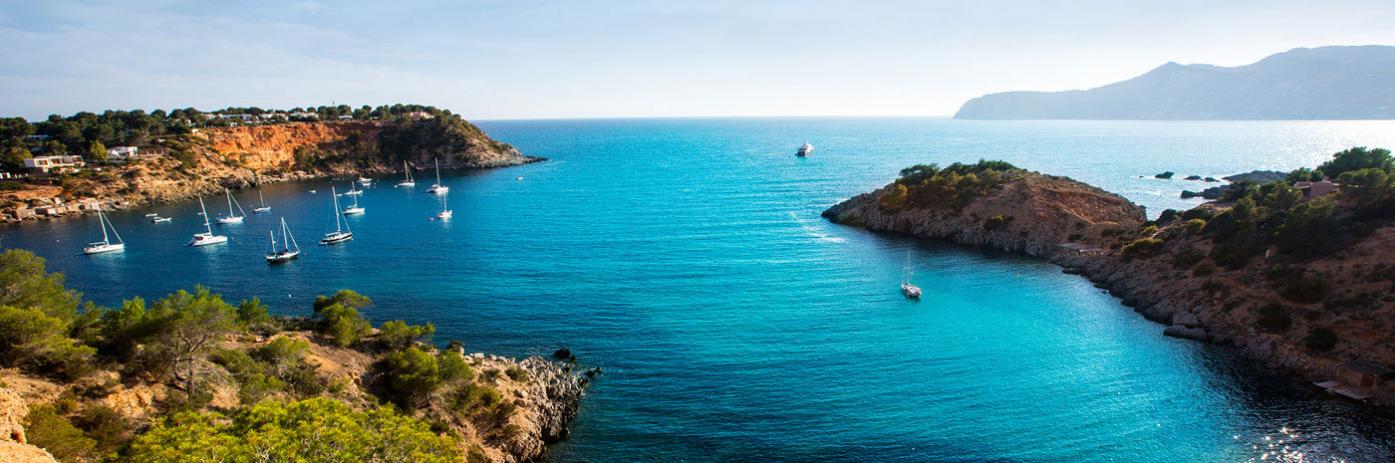 Beautiful blue-green water surrounded by the green land.