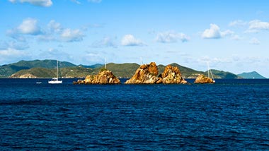Deep blue water surrounds an island.