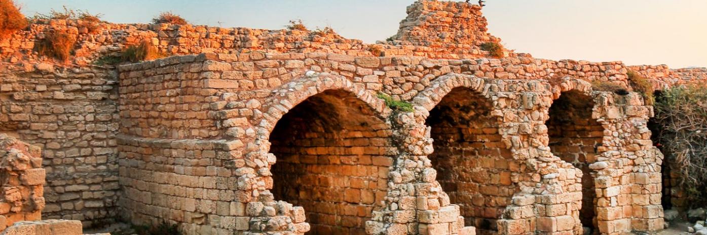 Ancient ruins of pillars and structures.