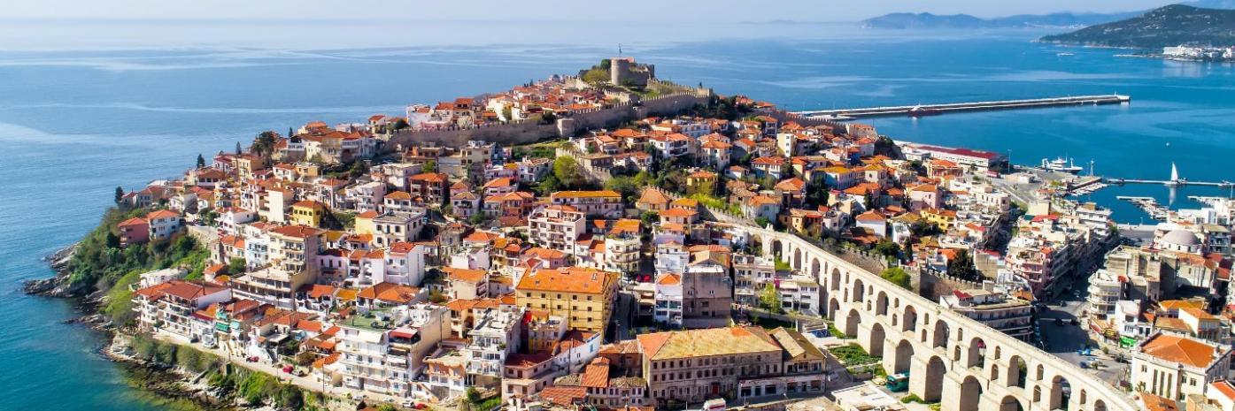 A city surrounded by water, with an ancient aqueduct running through.