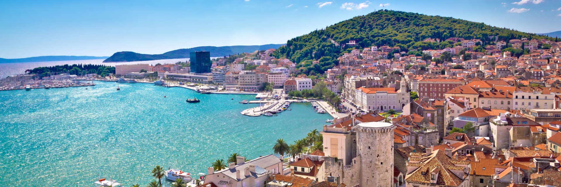 Waterfront and hill aerial view of Adriatic Coast.
