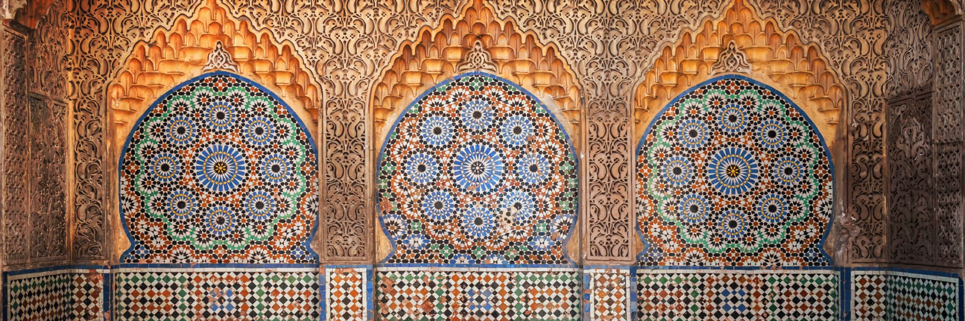 Colorful ancient mosaic wall.