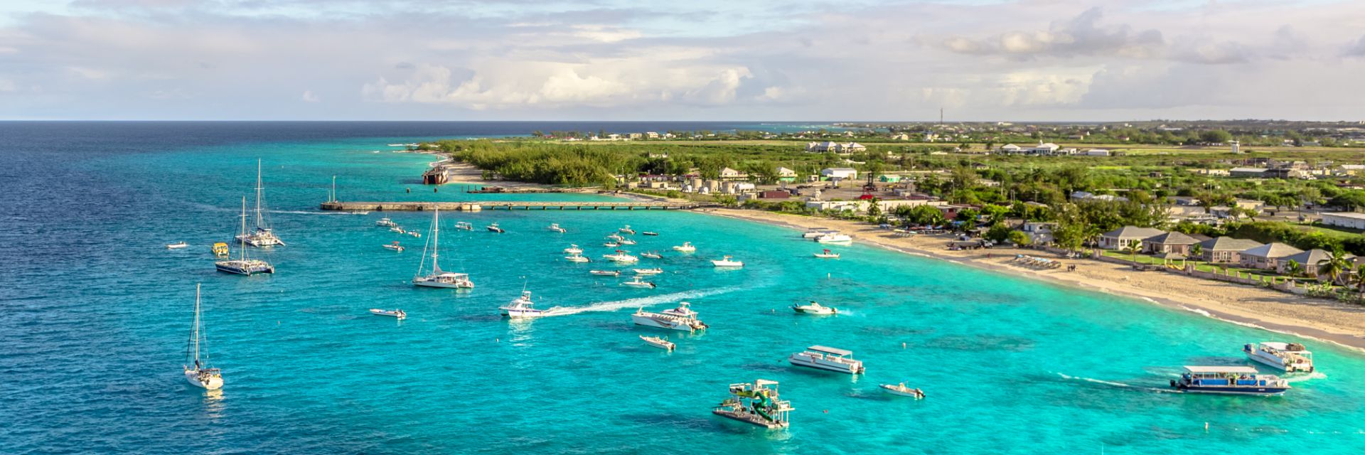 The turquoise blue waters ease into the coast of Grand Turk, Turks & Caicos Islands.