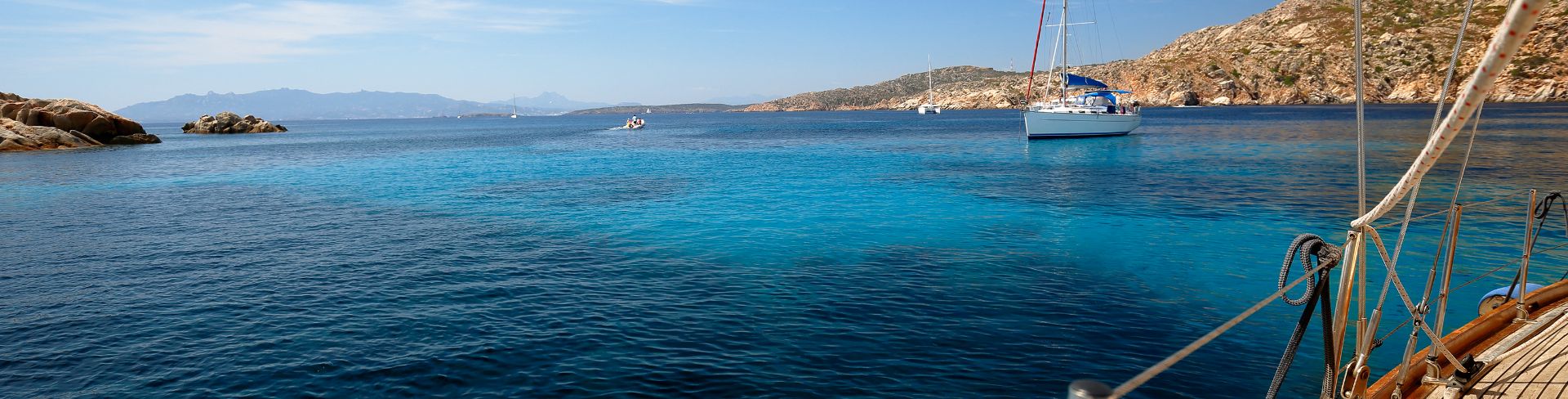 The view from a sailboat in a bay off the coast of Sardinia.