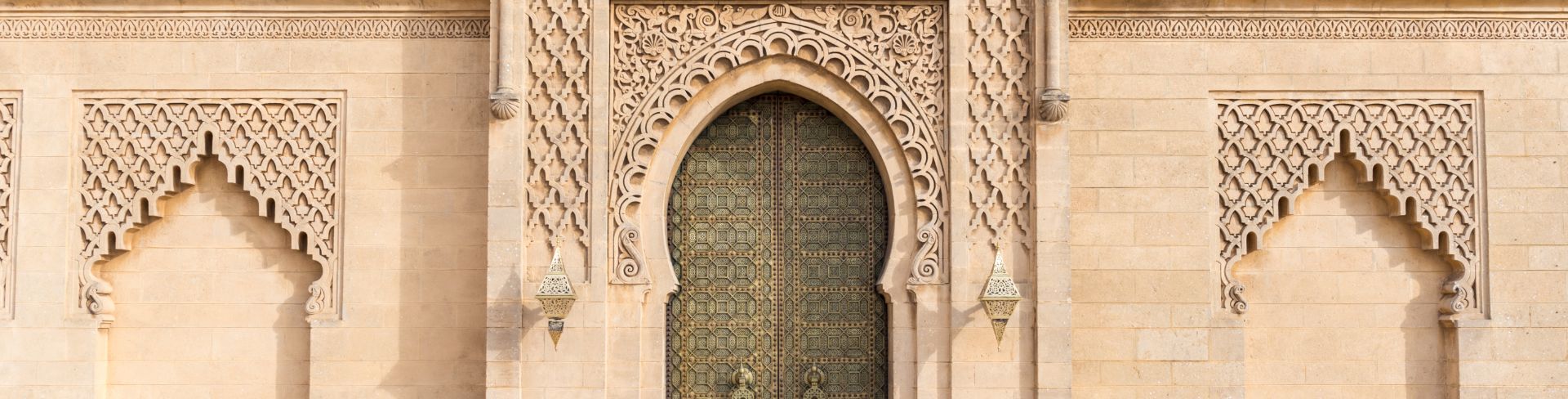 The intricately decorated doorway of the Mosque Hassan.