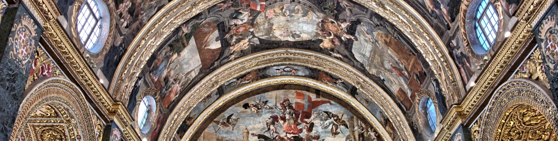 The intricately painted vaulted ceiling of St. Johns Co-Cathedral in Valletta, Malta.