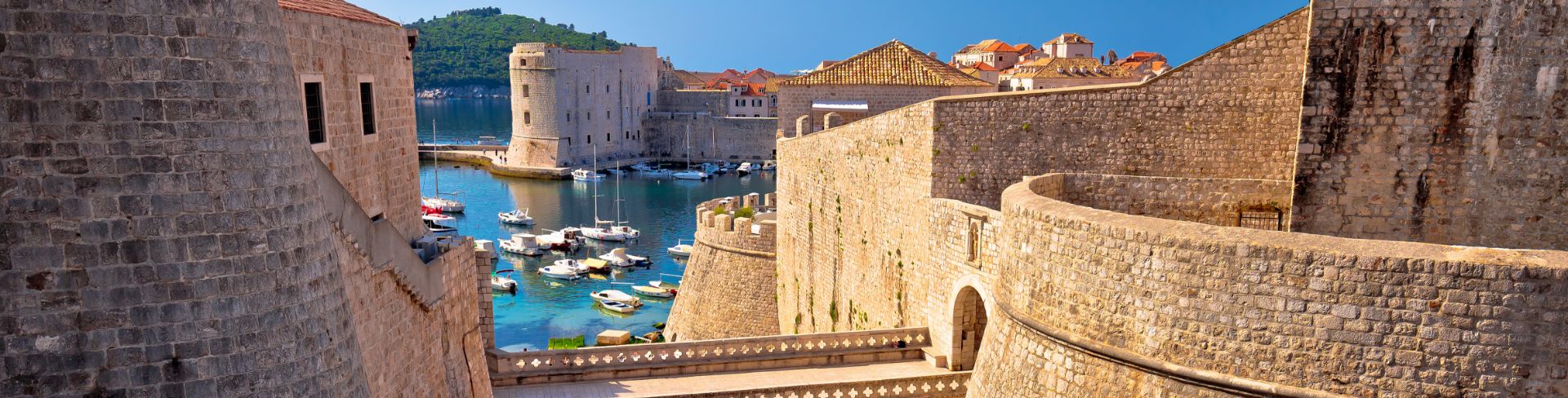 The winding path through the old walls leads to the marina. 