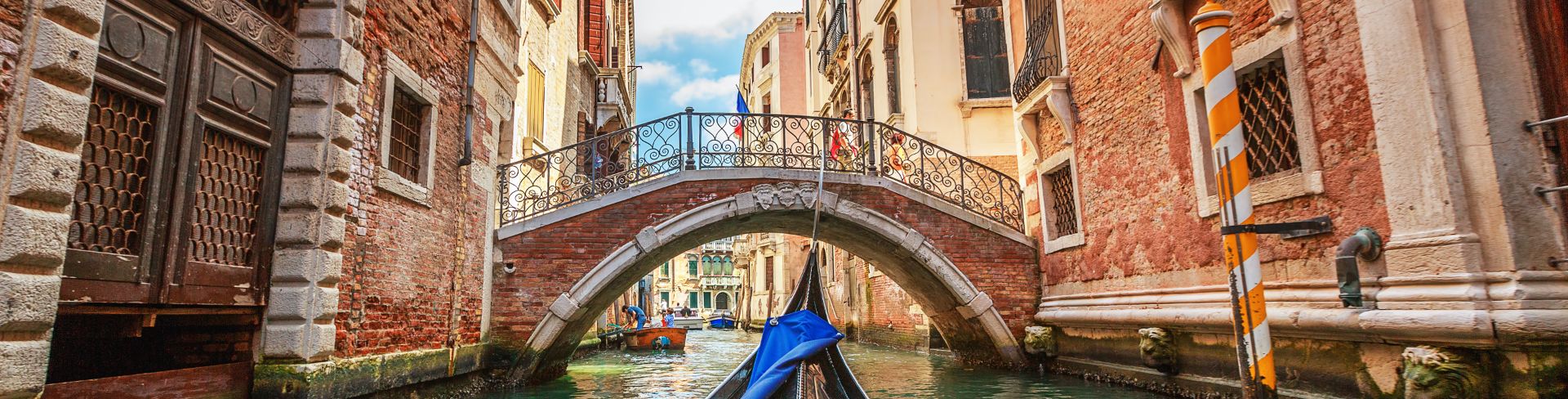 A view from the gondola while floating through the Venice canals.
