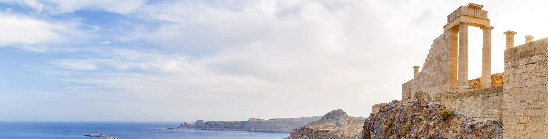 The Acropolis of Lindos on a hilltop overlooking the sea.