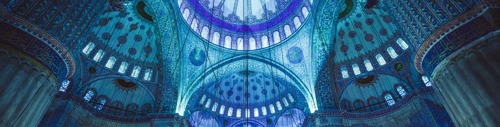 The ceiling of the Blue Mosque, featuring domes adorned with blue Iznik-style tiles.