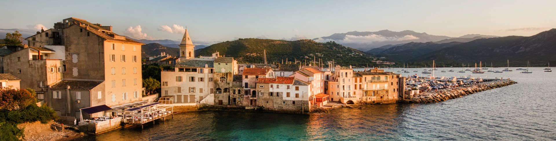 The coastal city of Saint-Florent at sunset.