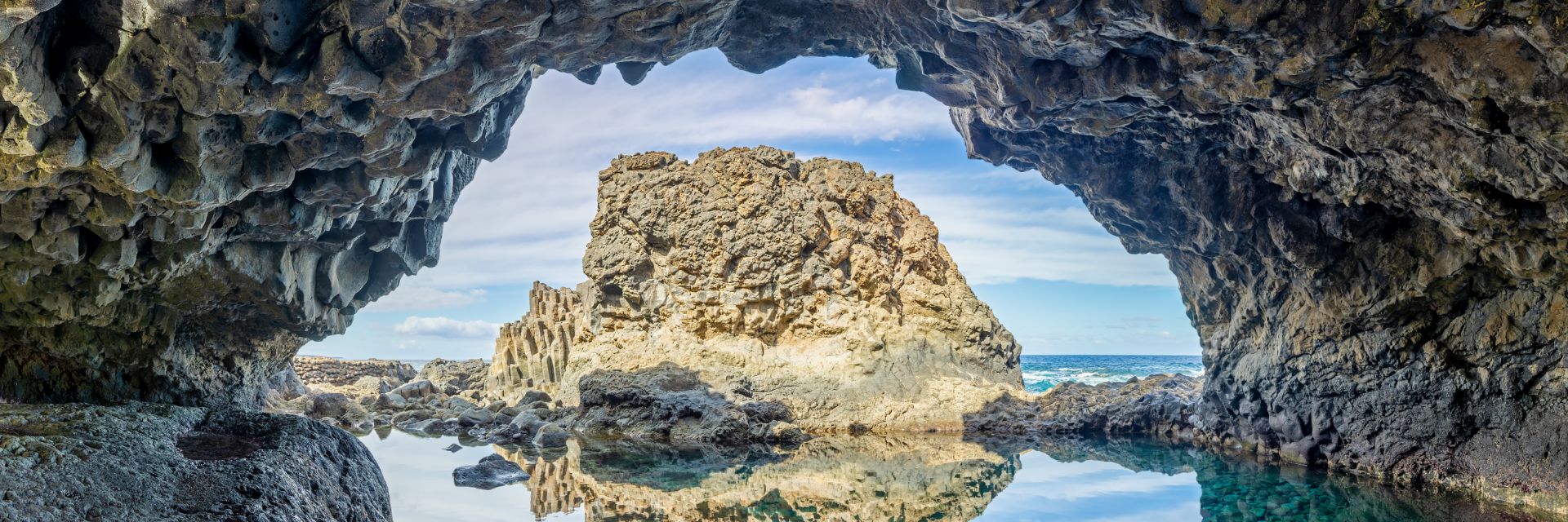 A volcanic cavern at Charco Azul beach on El Hierro, Canary Islands, Spain.
