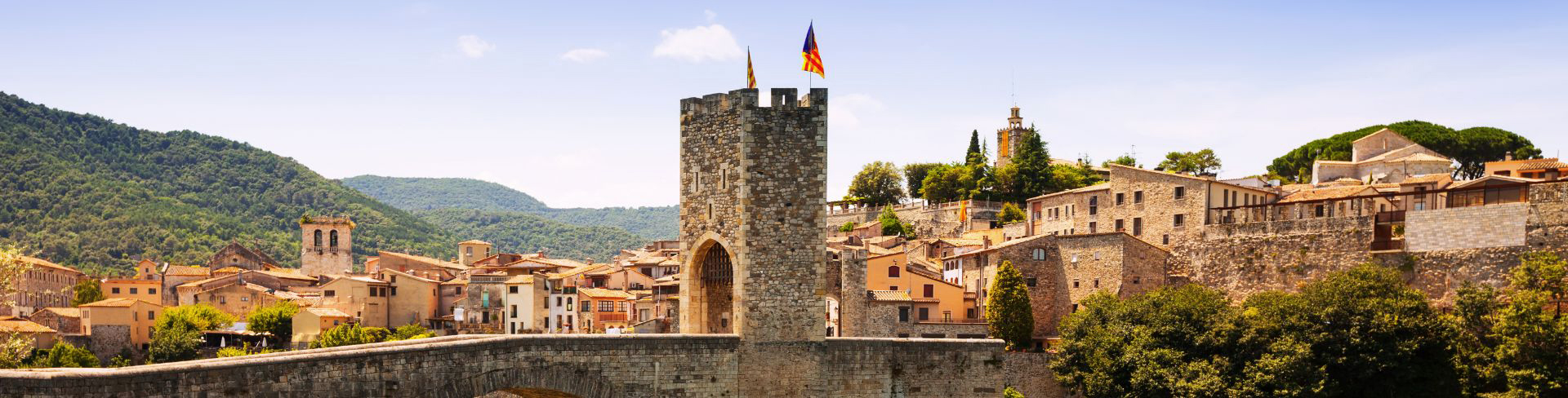 A medieval bridge and gate in Girona, Spain.