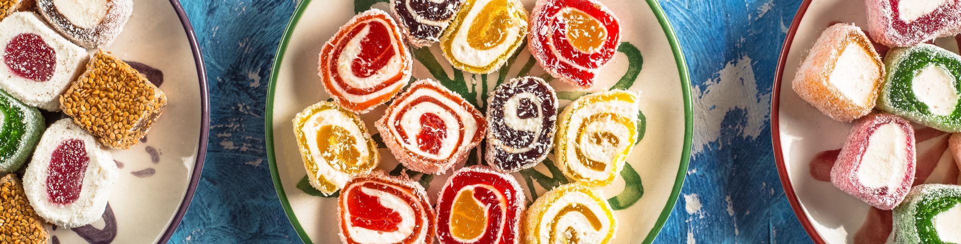 Three bowls of food sit on a table