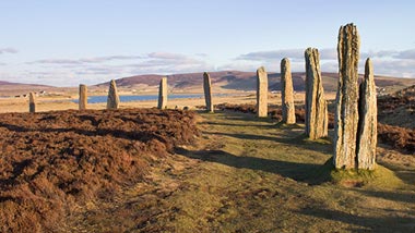 Tall stones forming a circle in a historic site.