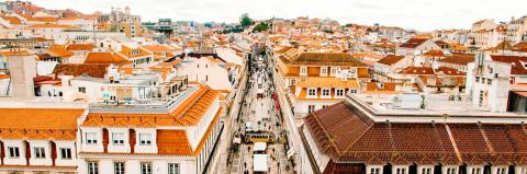 An orange-hued city street.